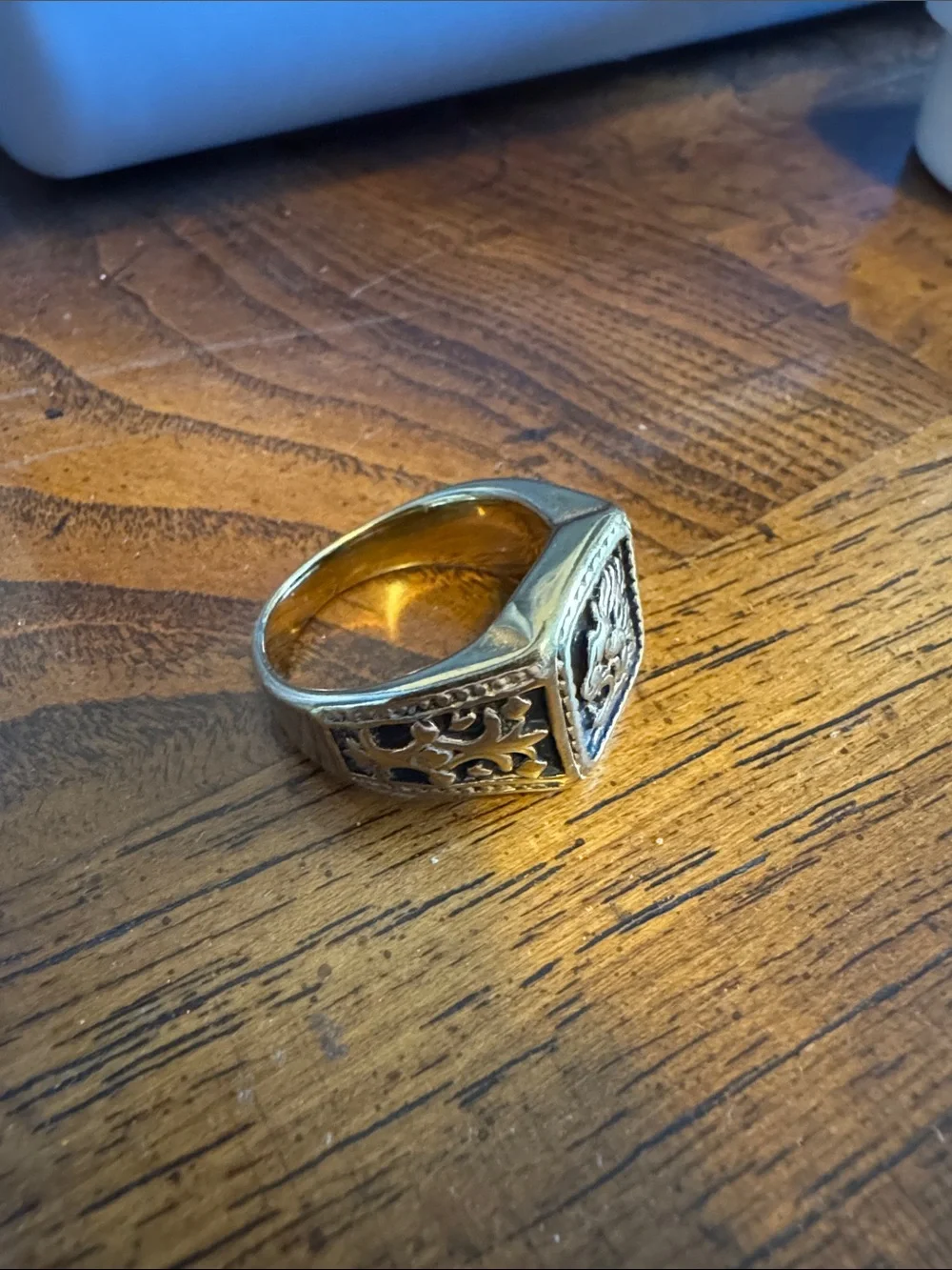 Men's Gold and Black Lion Emblem Signet Ring